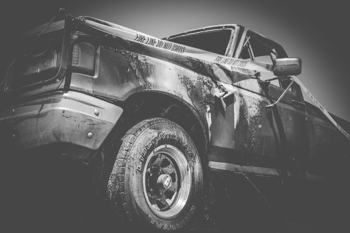 Real pickup truck with extensive body and fire damage